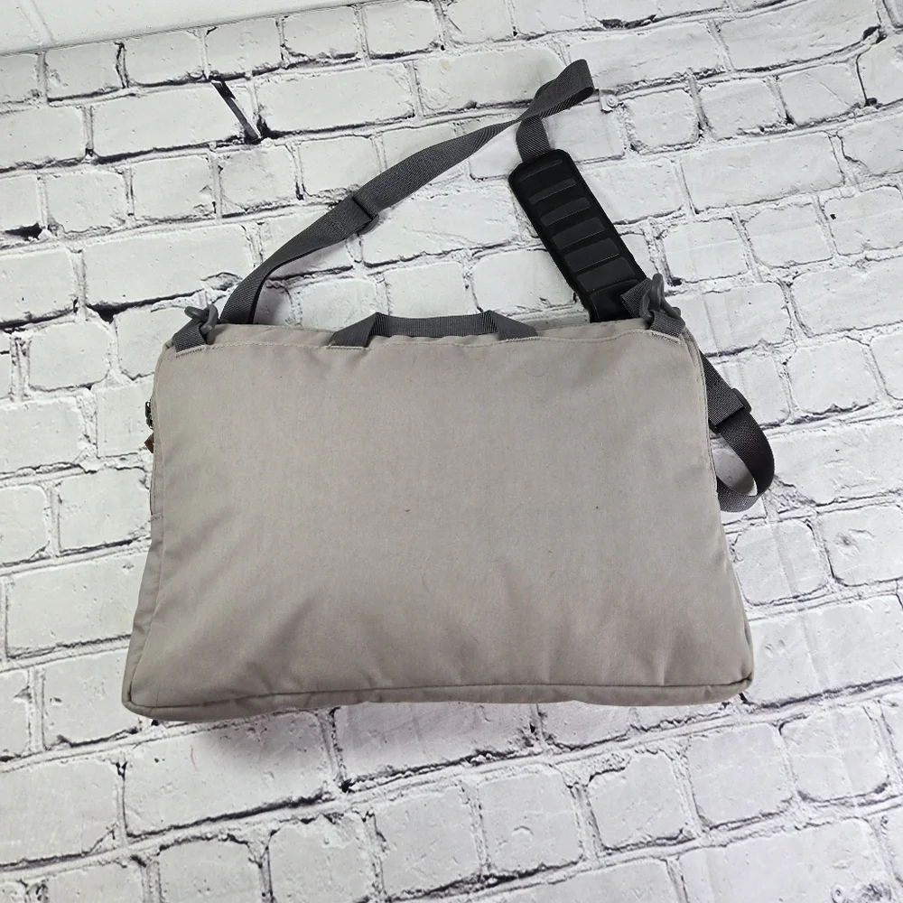 Cotopaxi Chuspa Messenger Bag In Light gray padded laptop bag